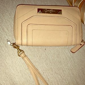 Never used tan leather wristlet